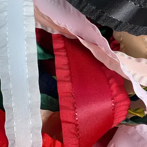 Close-up of colorful ruffled polyester ribbons for DIY hair bows and gift wrapping crafts
