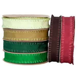Multi-colored ruffled edge ribbons for DIY hair accessories and floral packaging.