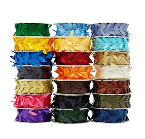 Vibrant rolls of colorful ultrasonic embossed leaf ribbons for floral binding and decor