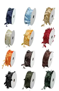 Detailed view of leaf shaped ultrasonic embossed ribbons in 12 assorted colors for decoration