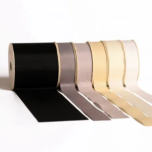 Hochdichte Polyester-Ripsbandrollen in verschiedenen neutralen und warmen Farben.