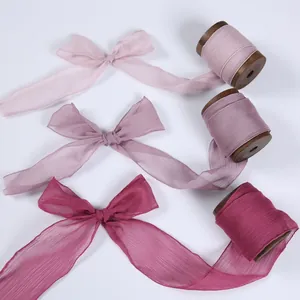 Elegant handmade frayed edge chiffon silk ribbons in pink tones for wedding bouquet decor