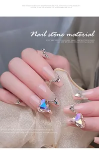 Close-up detail of sparkling heart-shaped K9 crystal gems for luxury nail art decoration