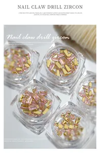Detailansicht von luxuriösen rosa Krallen-Zirkonen für Nailart in Mischformen