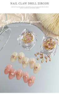 Nahaufnahme von rosa Zirkonia-Krallensteinen auf Nagelspitzen in Formen