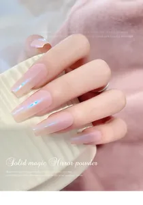 Close-up of pink aurora nail powder with a high-shine iridescent mirror finish