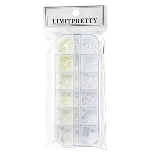 Set di perle per nail art in 12 scomparti bianco e crema in confezione trasparente