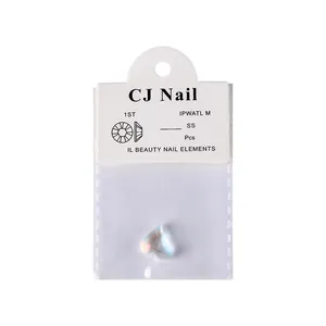 Cristal de gema de uñas en forma de corazón iridiscente para manicura envasado