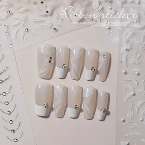 Elegant 3D ribbon nail art stickers with relief flower pearls and rhinestone accents