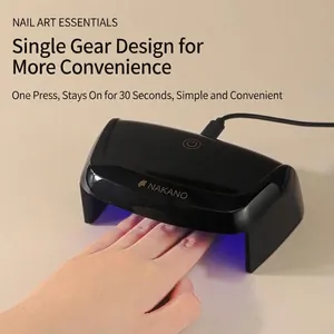 Portable mini 12W LED nail lamp for quick drying, professional sleek black design