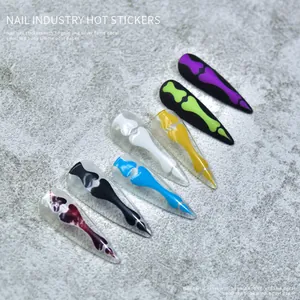 Creative bone and claw pattern nail art stickers in various colors for Halloween styling