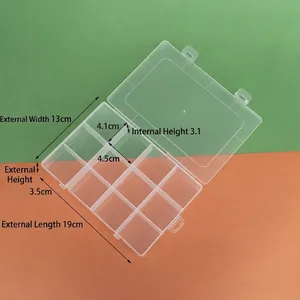 Dimensiones detalladas de la caja de almacenamiento de PP transparente con 12 compartimentos.