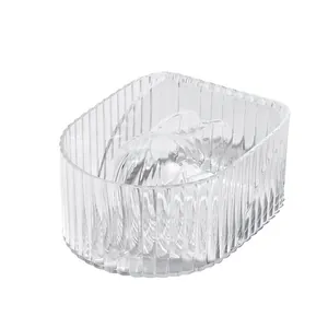 Transparent acrylic nail soaking bowl with ergonomic hand rest for manicure