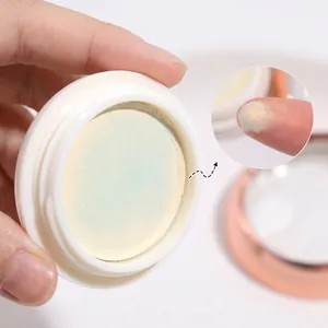 Solid aurora nail powder in moonstone white with iridescent mirror chrome finish swatch
