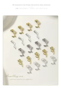 High-detail macro view of 3D alloy rose nail decorations in gold and silver finishes