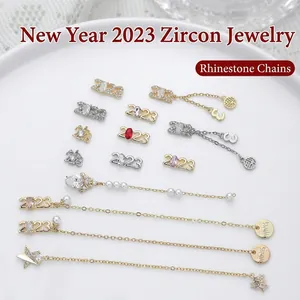 Breloques d'art d'ongle en zircon 2023 de luxe avec pendentifs chaîne et détails caractère Fu