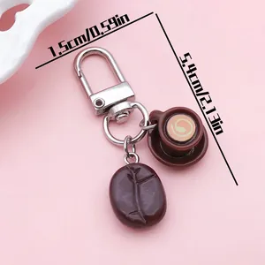 Detailansicht Schlüsselanhänger Kaffeebohne und Tasse mit Maßen 1,5cm und 5,4cm
