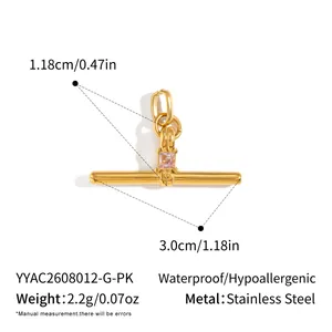 Close-up of gold T-bar pendant with pink zircon showing detailed dimensions and weight