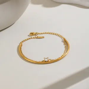 Close-up of 18K gold plated stainless steel bracelet with round zircon detail