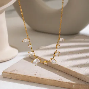 Close-up of French vintage geometric CZ necklace with 18K gold plated stainless steel chain