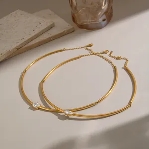 Detail shot of gold plated stainless steel choker with marquise cut clear crystal