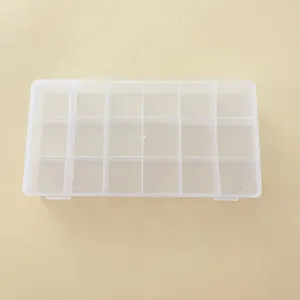 Detailed view of the 18-compartment clear plastic storage box for hardware parts and jewelry