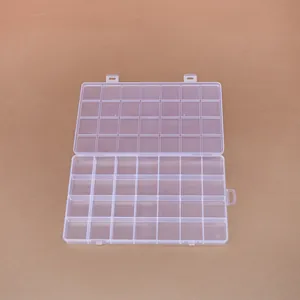 Detail view of a 28-compartment transparent PP storage box for jewelry and beads