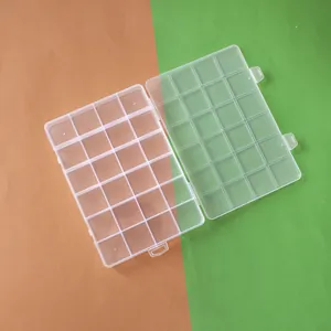 Detail view of 24-compartment transparent plastic storage box for DIY jewelry beads