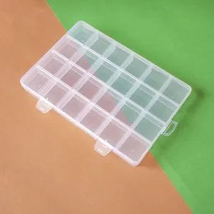 Detailed view of a 24-compartment transparent plastic storage box for DIY jewelry beads