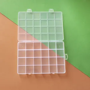 Detailed view of 24-compartment transparent plastic storage box for DIY jewelry beads