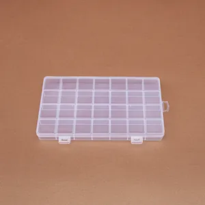 Detailed overhead view of a 28-compartment clear plastic storage organizer box.