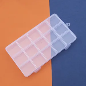 Detailed top view of a transparent 15-compartment plastic storage organizer box