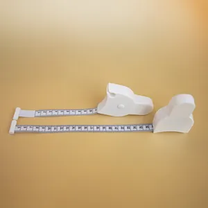 Detailed view of white Y-shaped body measuring tape showing metric and imperial scales