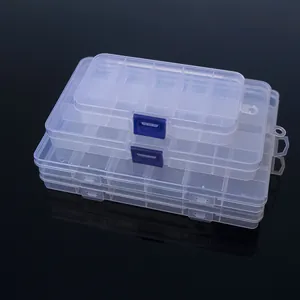 Cajas de almacenamiento de plástico transparente con compartimentos y cierres azules.