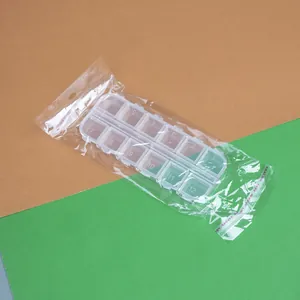Caja de almacenamiento de plástico transparente de 12 rejillas para decoración de uñas
