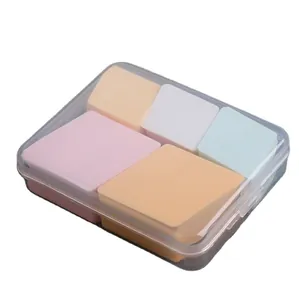 Transparent makeup sponge storage box with five multi-colored facial powder puffs