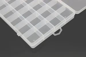 Close-up detail of a fixed 24-grid transparent plastic storage box for beads and jewelry