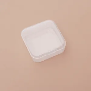 Detailed close-up view of a small 5cm square PP plastic storage box with a hinged lid.