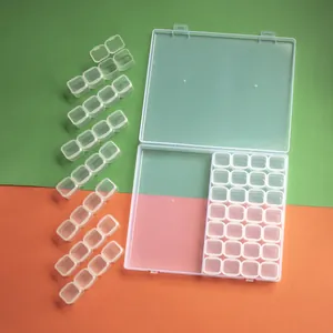 Detailed view of 56-grid transparent plastic storage box for diamond painting and jewelry