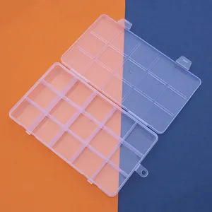 Detailed view of a transparent 15-compartment plastic storage box with secure double buckles
