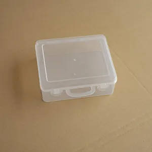 Small transparent plastic storage box with handle for stationery and toys