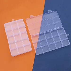 Macro view of 15-grid translucent plastic storage boxes shown in open and closed states