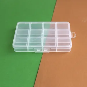 Top view of a 12-grid clear plastic organizer box for beads and DIY crafts