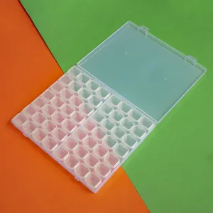 Macro view of 56-grid clear plastic organizer for diamond painting jewelry storage