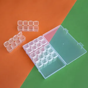 Vista detallada de caja de plástico de 28 compartimentos para pintura de diamante