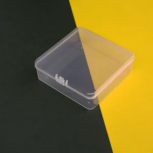 Detail shot of a 11.5cm square transparent plastic storage box with secure latch lid