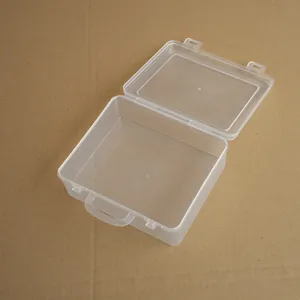 Detail view of a transparent plastic storage box with handle, shown in an open state.