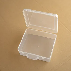 Small transparent plastic storage box with handle and hinged lid for toys
