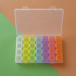 Caja de almacenamiento arcoíris de 28 compartimentos para pintura de diamantes y manicura