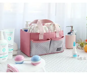 Luxe draagbare luier organizer van roze stof met stippen zakken voor de babykamer